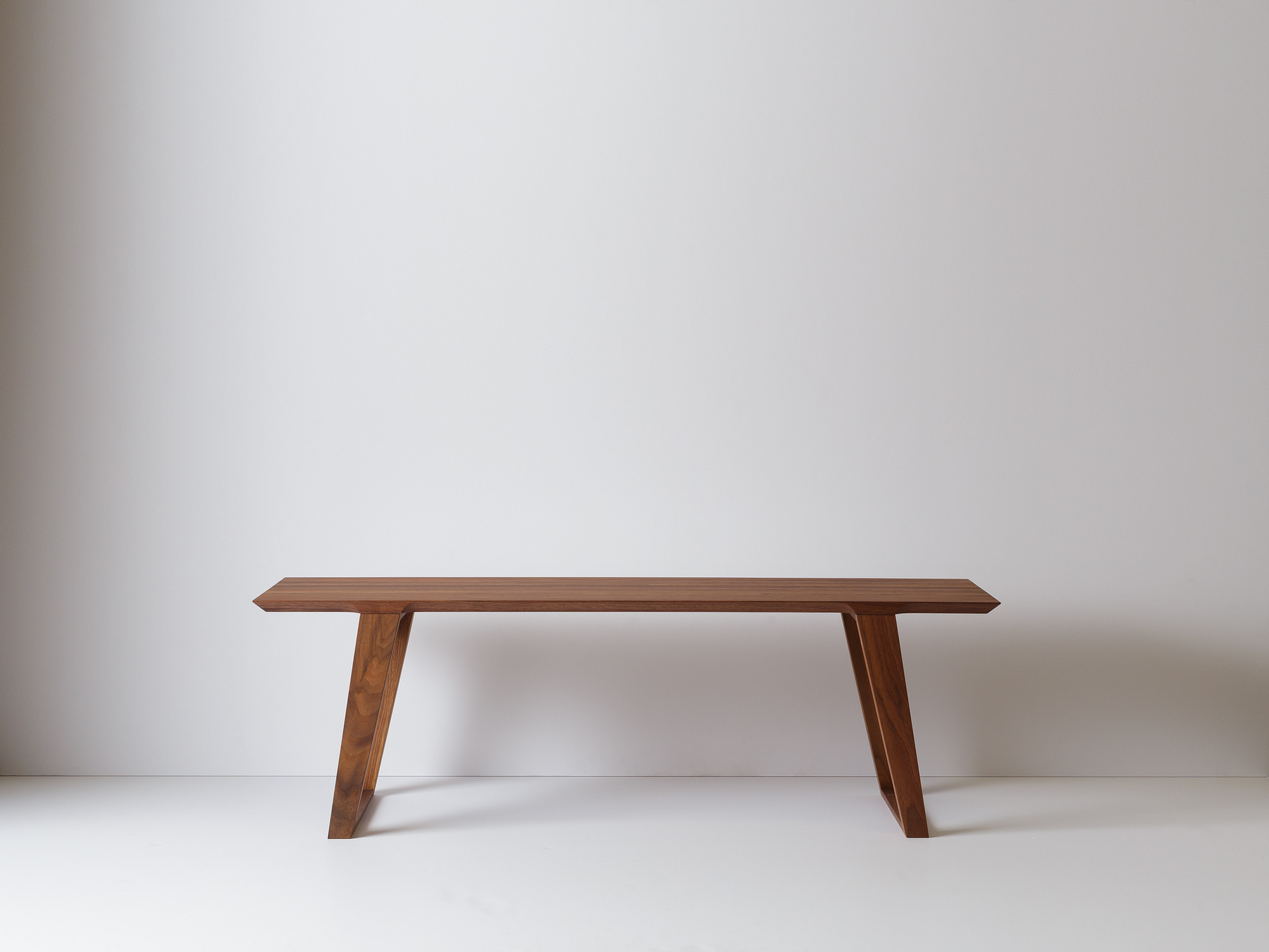 Modern Contemporary Isometric Bench Coffee Table in solid walnut
